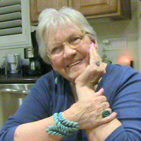 Betty headshot turquoise bracelet